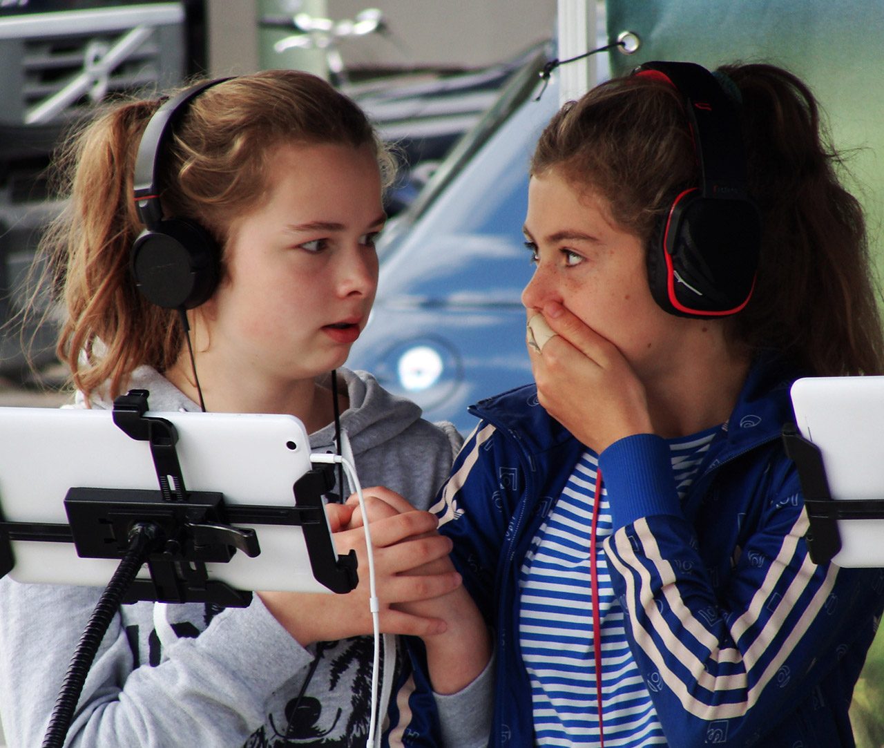 Two girls watching videos