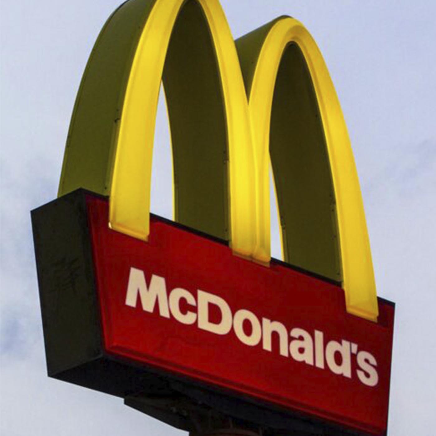 Sky,Yellow,Signage,Facade,Logo,Rectangle,Circle