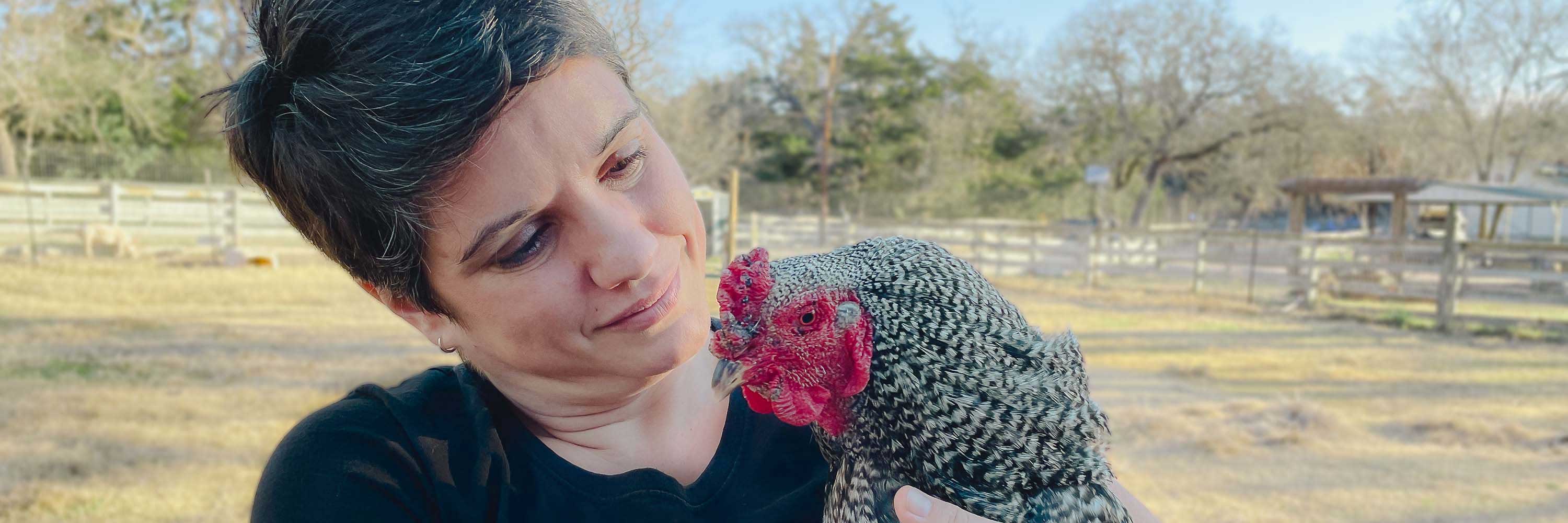 Sharon holding chicken