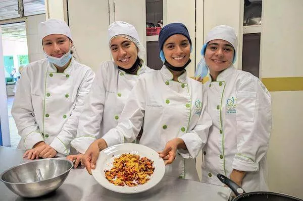 Dietetics students preparing plant-based foods during a Love Veg workshop.