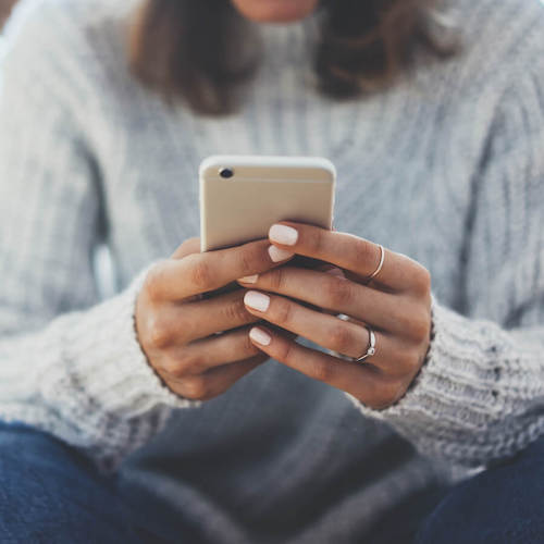 Woman holding a mobile phone