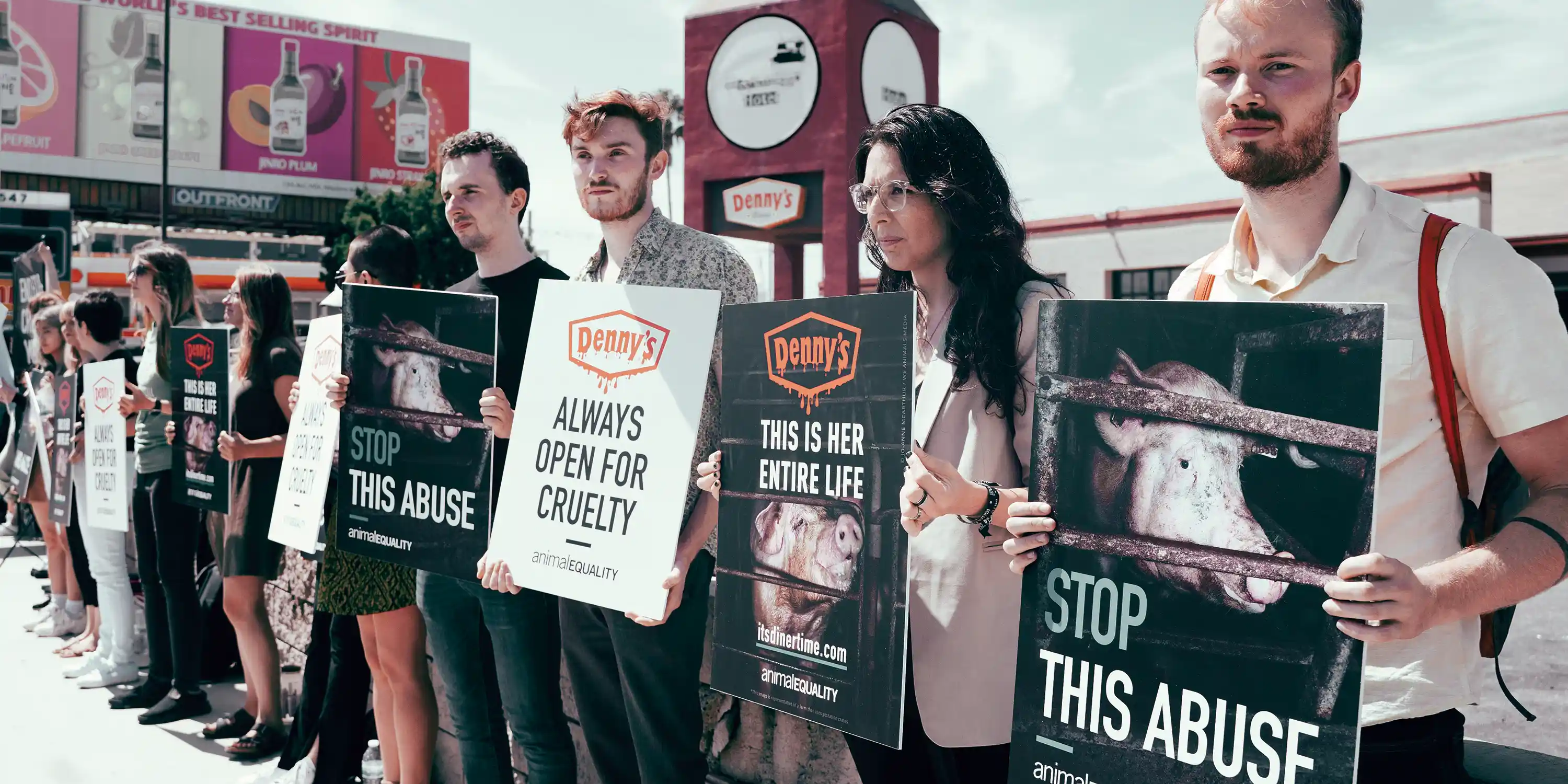 Animal Equality volunteers protesting in defense of animals