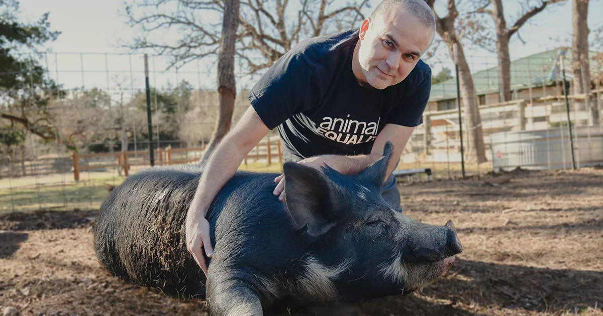 Jose with pig