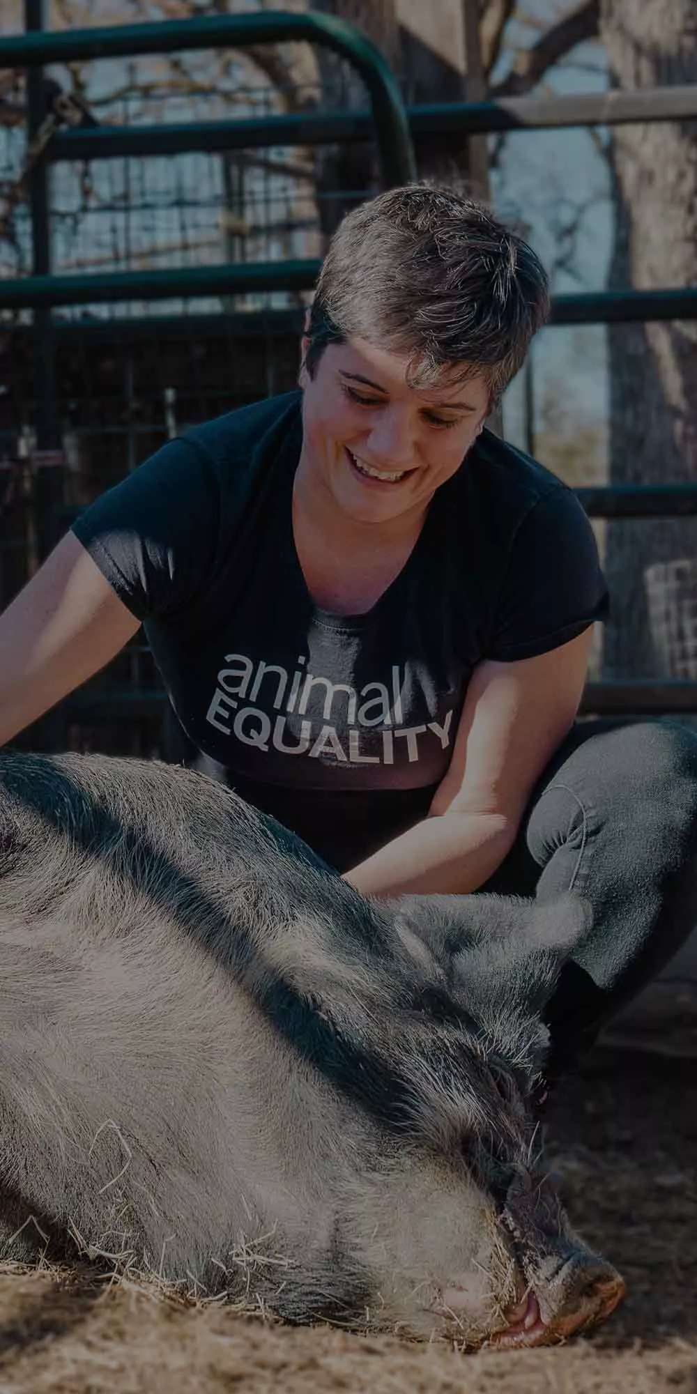 Sharon with a rescued pig