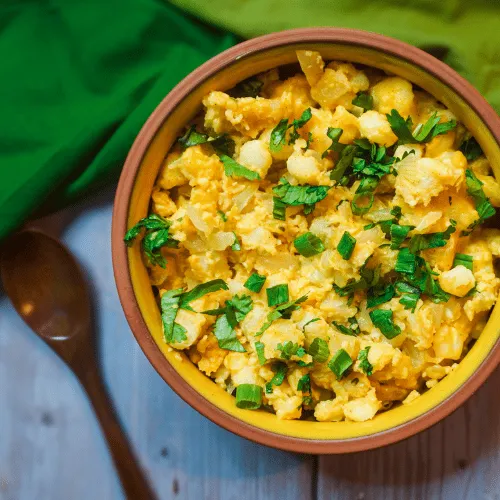 A vibrant plant-based dish served in a bowl, garnished and ready to eat.
