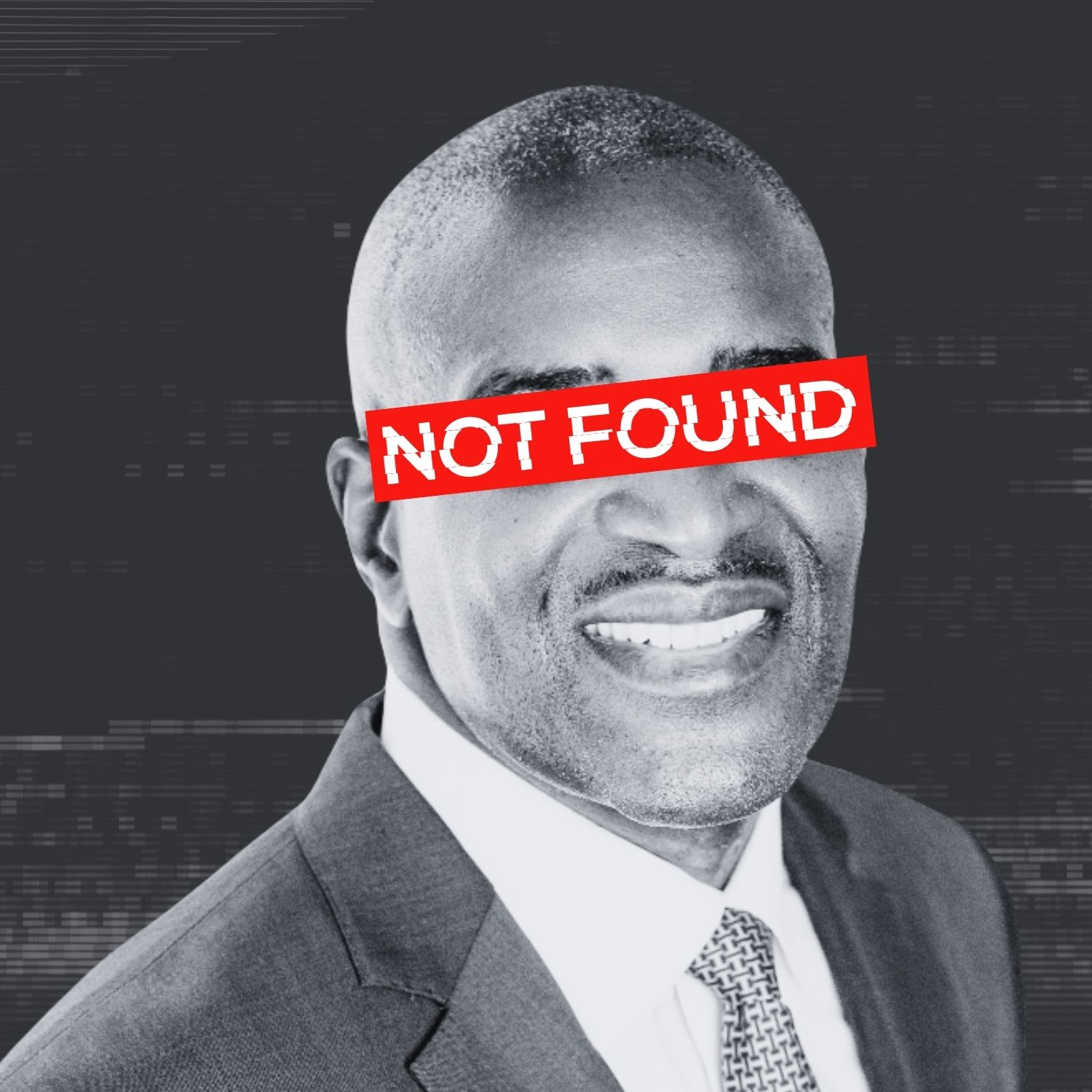 Michael Brown with a red sign covering his eyes that reads "Not Found"