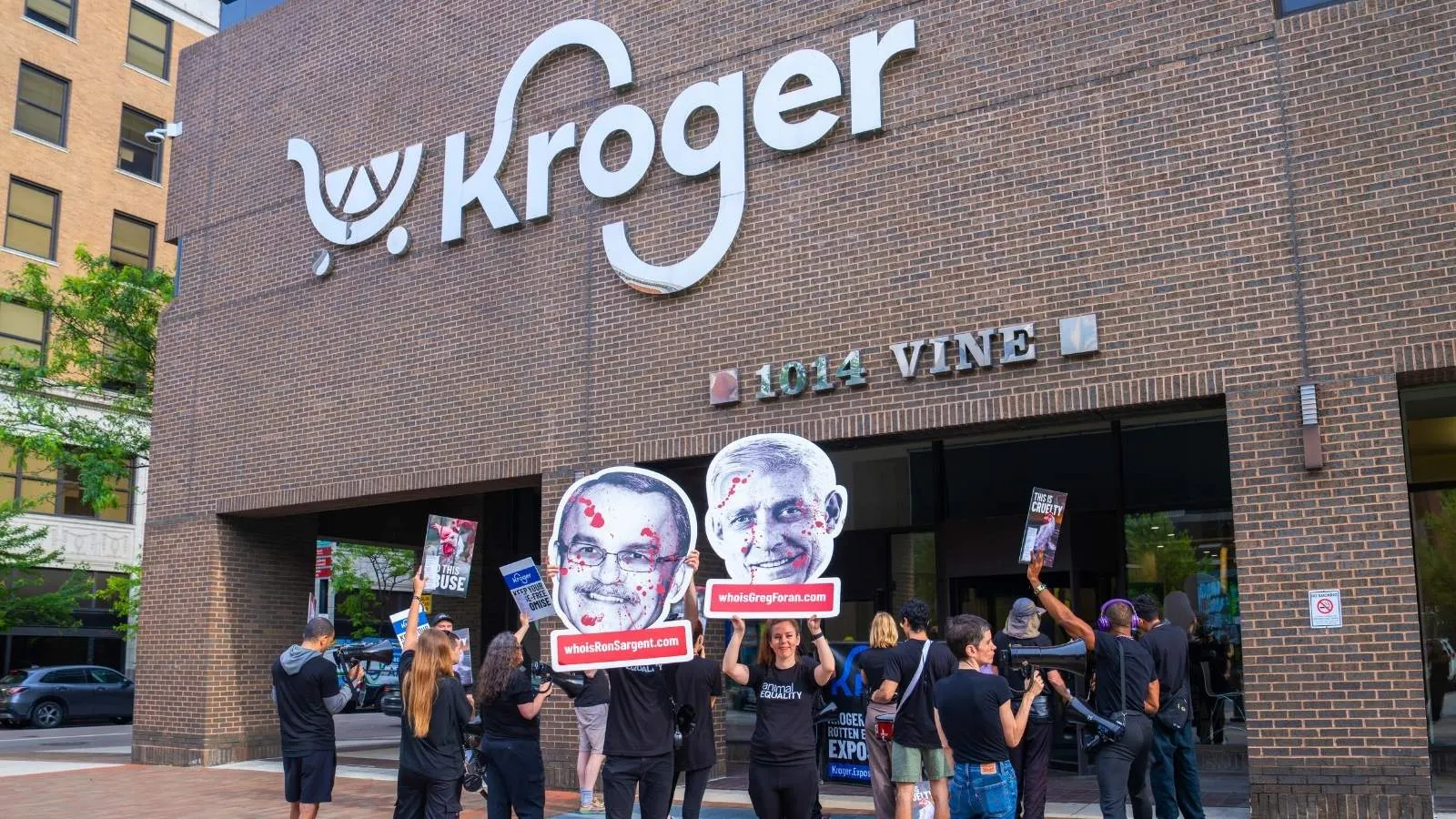 Activists protest outside Kroger's headquarters in Cincinnati, Ohio