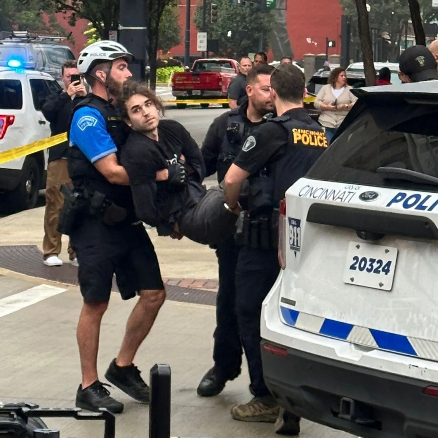Nine activists arrested at Kroger’s Cincinnati headquarters
