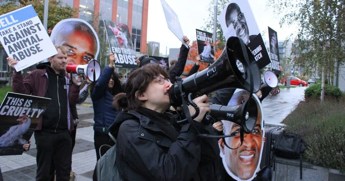 Animal Equality activists protest outside Dell’s Dublin offices on October 15, 2026, calling on the company to cut ties with Kroger board member Kevin Brown.