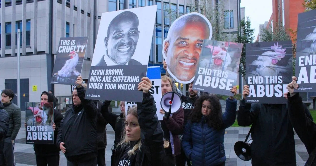 Animal Equality activists protest outside Dell’s Dublin offices on October 15, 2026, calling on the company to cut ties with Kroger board member Kevin Brown.