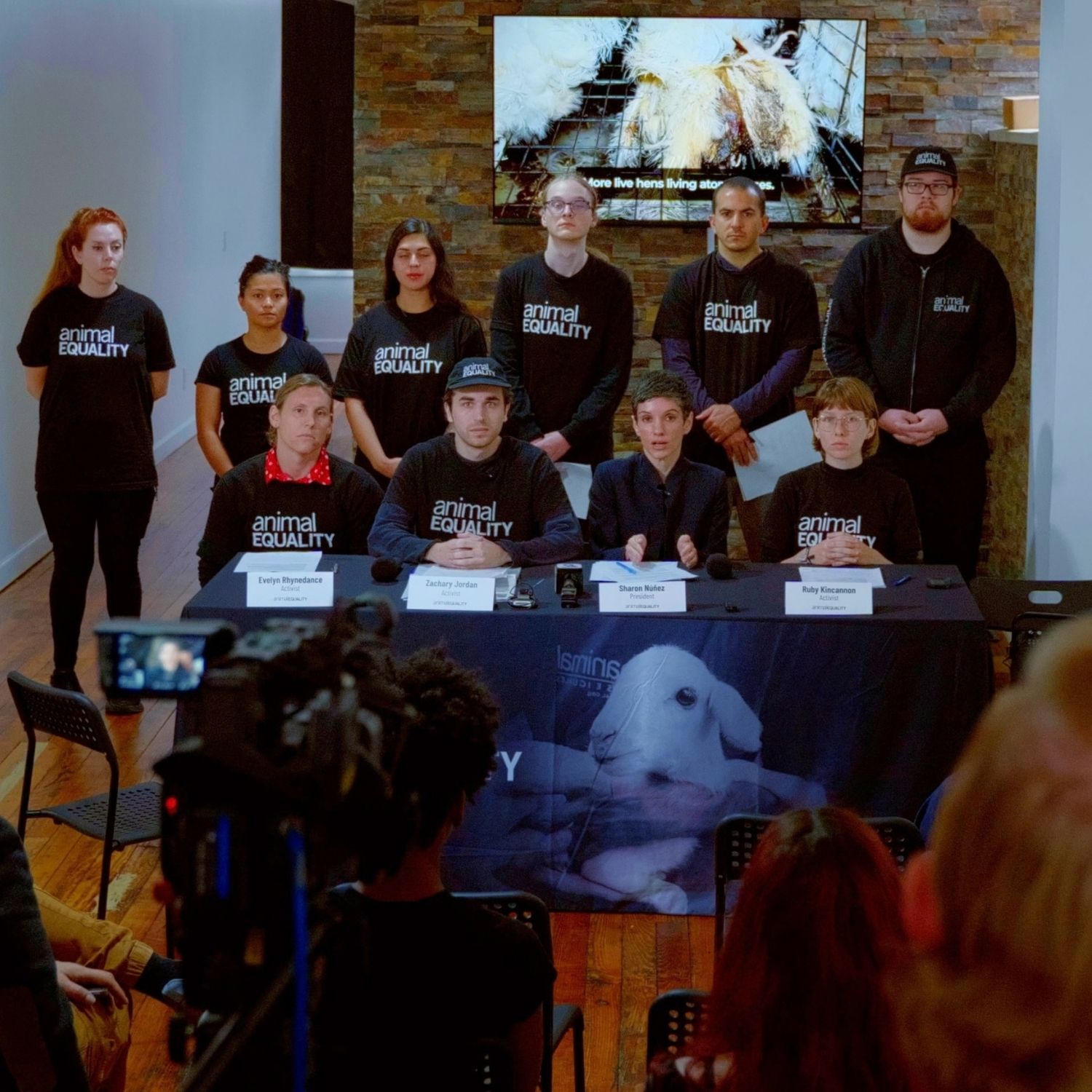 Animal Equality President Sharon Núñez sits alongside Animal Equality activists at a press conference table in Cincinnati, Ohio on September 24, 2026.