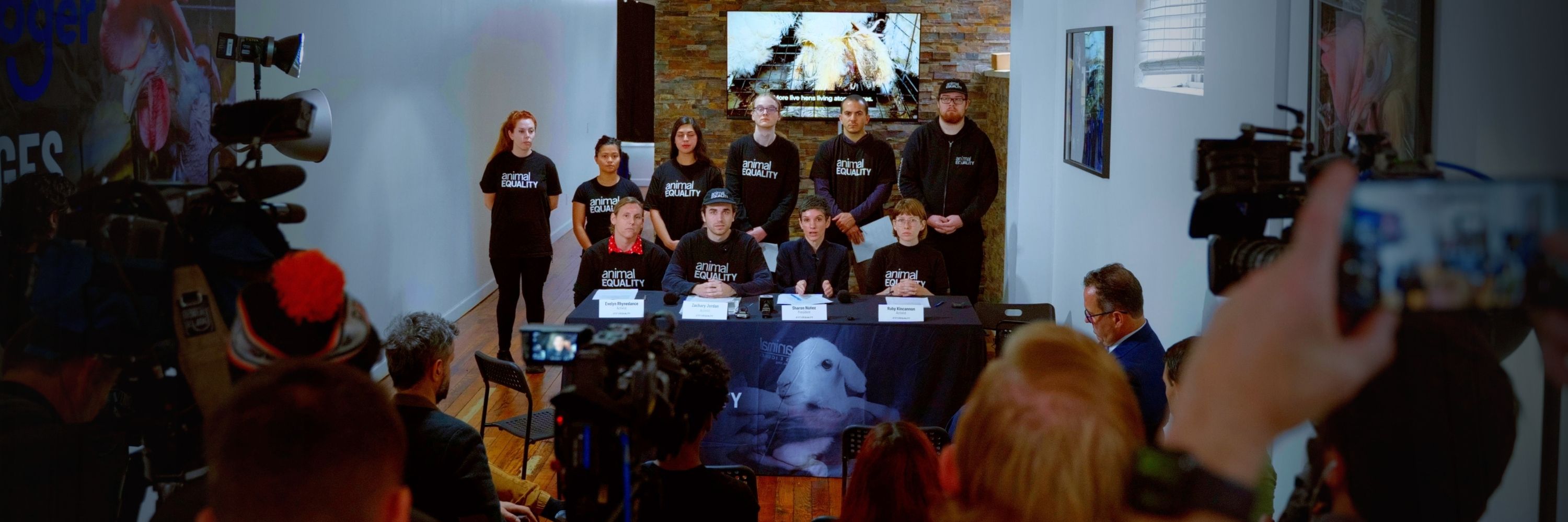 Animal Equality President Sharon Núñez sits alongside Animal Equality activists at a press conference table in Cincinnati, Ohio on September 24, 2026.