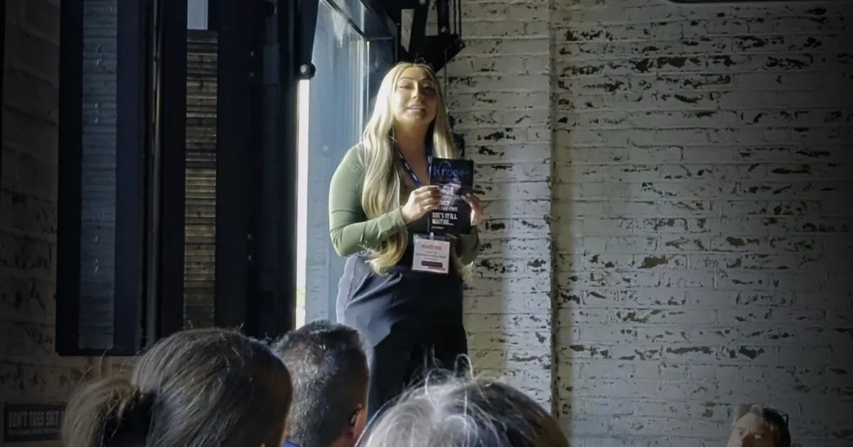 An Animal Equality activist speaks up inside a Kroger-sponsored event in Cincinnati to draw attention to the company’s broken cage-free commitment.