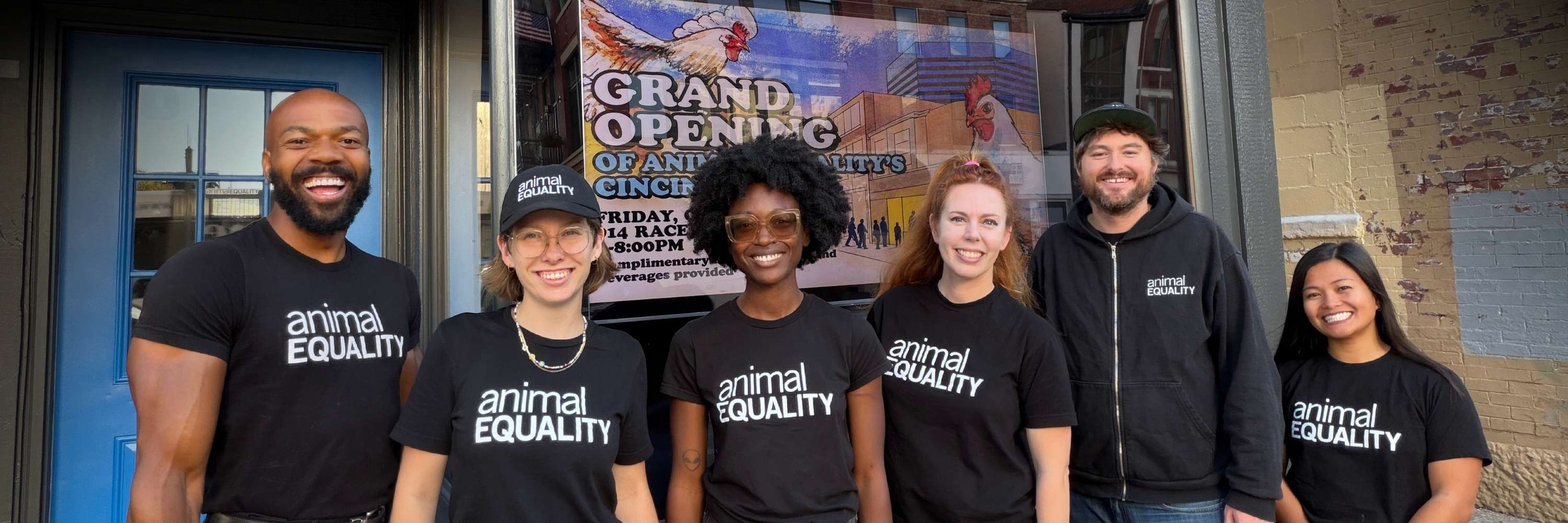 Animal Equality activists stand outside the organization’s new Cincinnati office at 914 Race Street, steps from Kroger’s headquarters, in Cincinnati, Ohio.